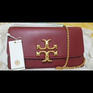 Tory Burch . Style it as a cross body bag or shoulder bag or as a clutch